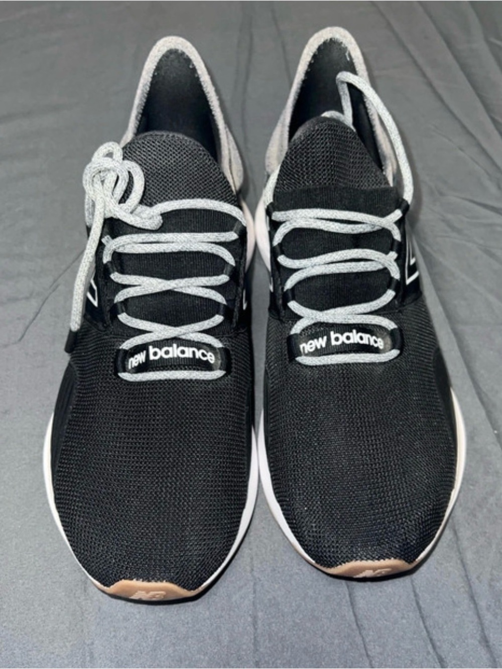 Never worn- New Balance Men’s Black and Gray Casual Sneakers